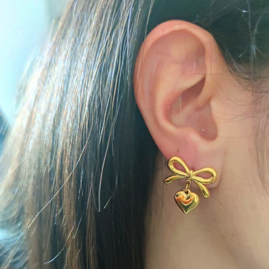 Orecchini fiocco cuore gold