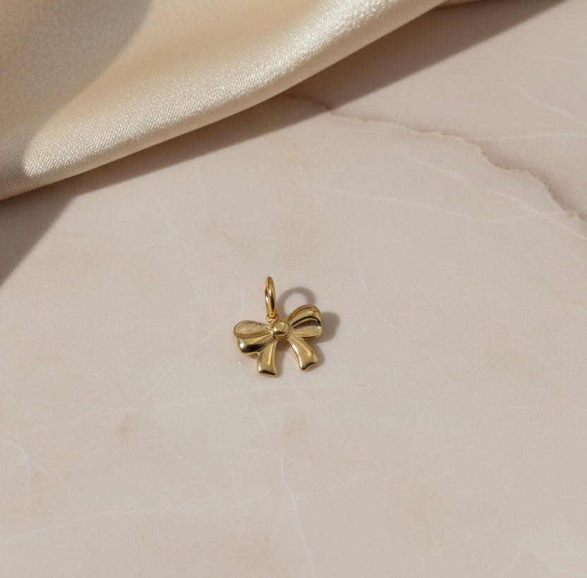 Ciondolo fiocchetto gold