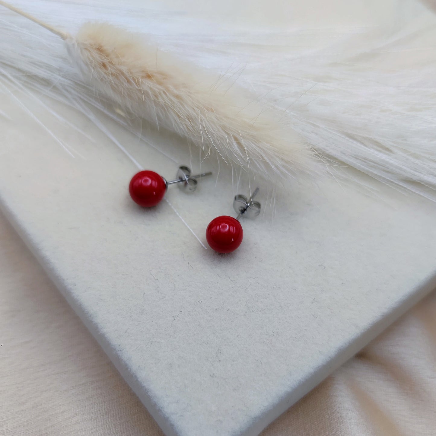Orecchini perline rosse