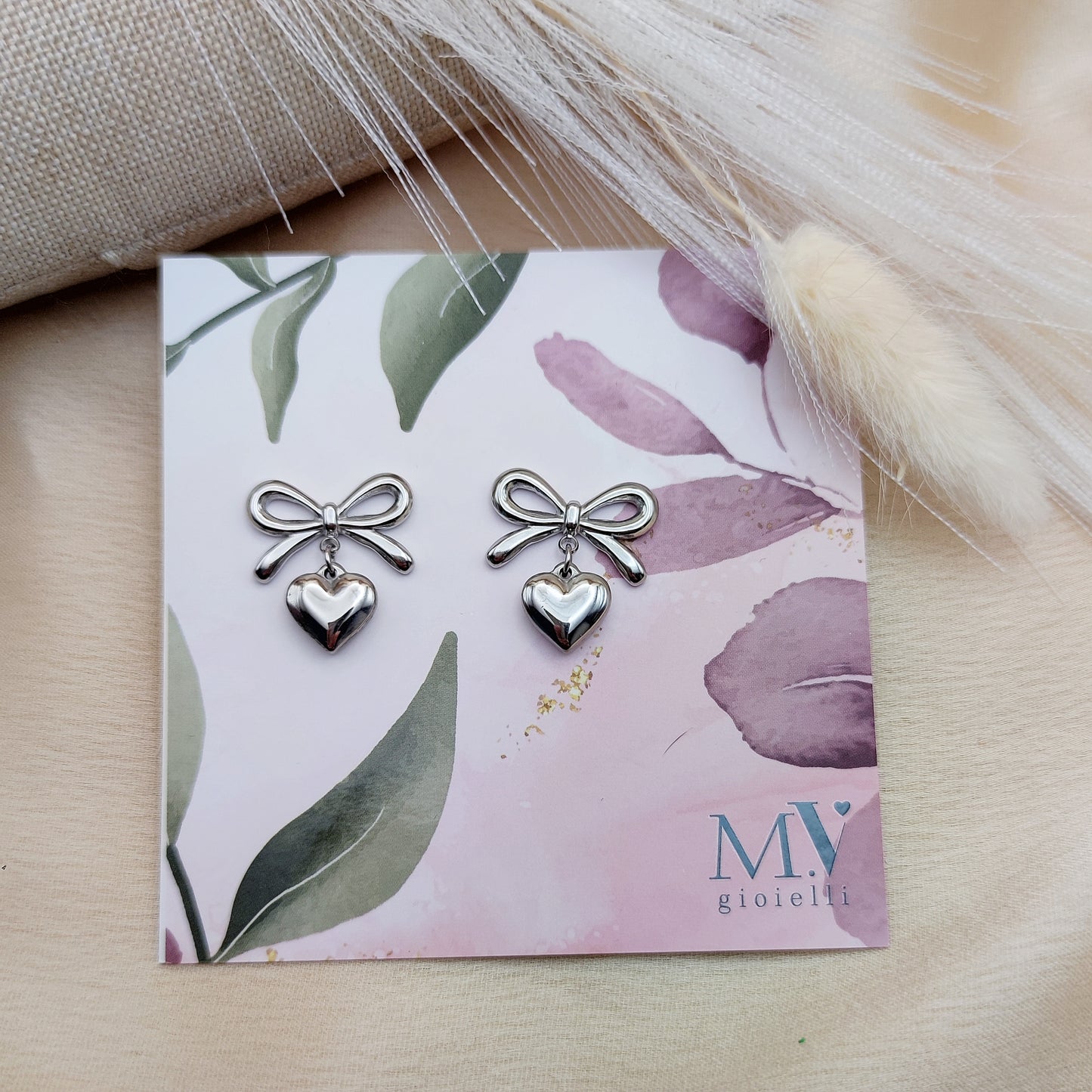 Orecchini fiocco cuore silver