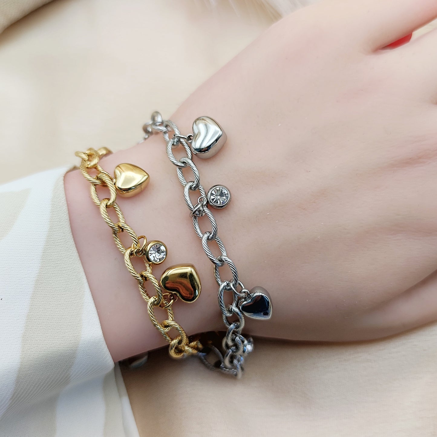 Bracciale multicharms cuori bombati gold