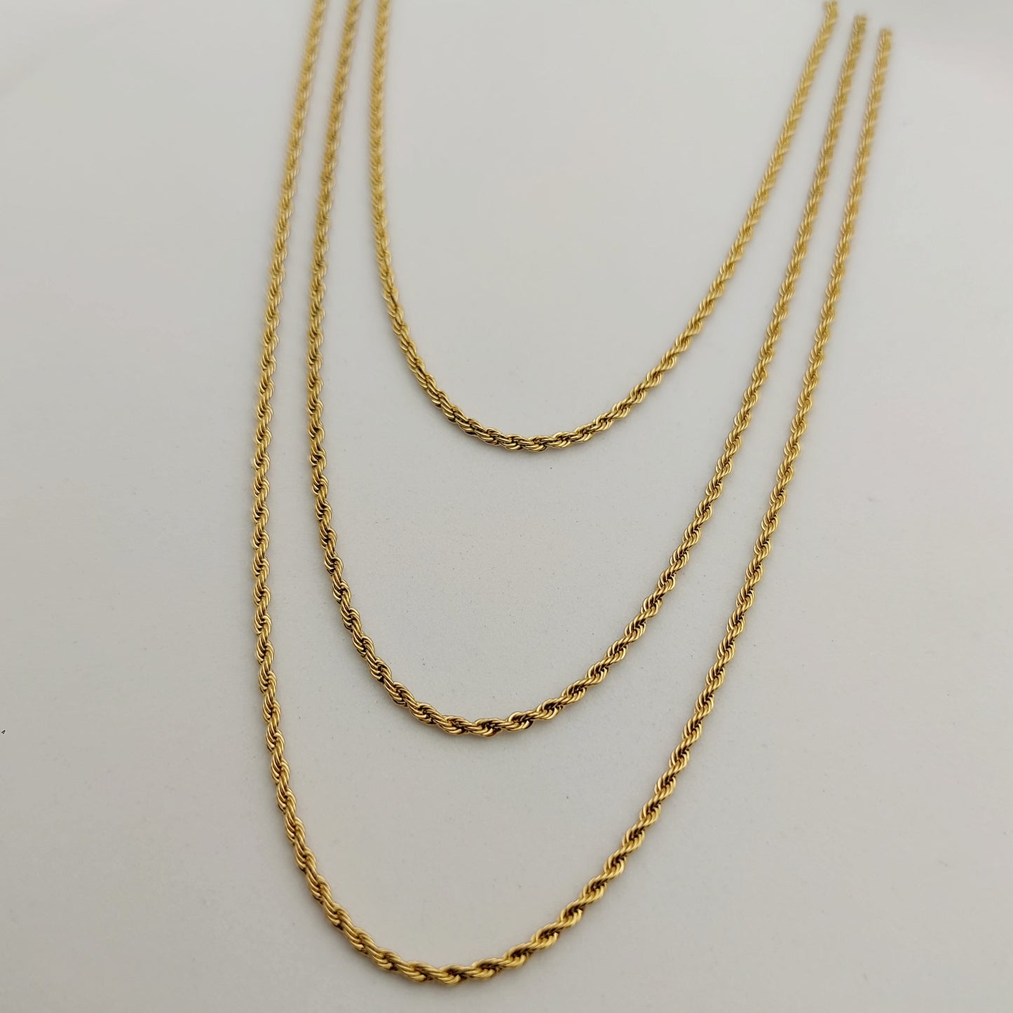 Collana tre fili torcion oro