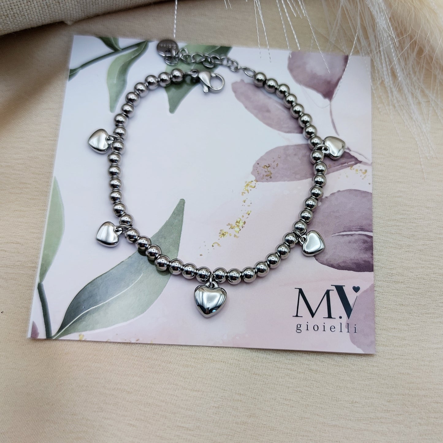 Bracciale sfere cuori charms