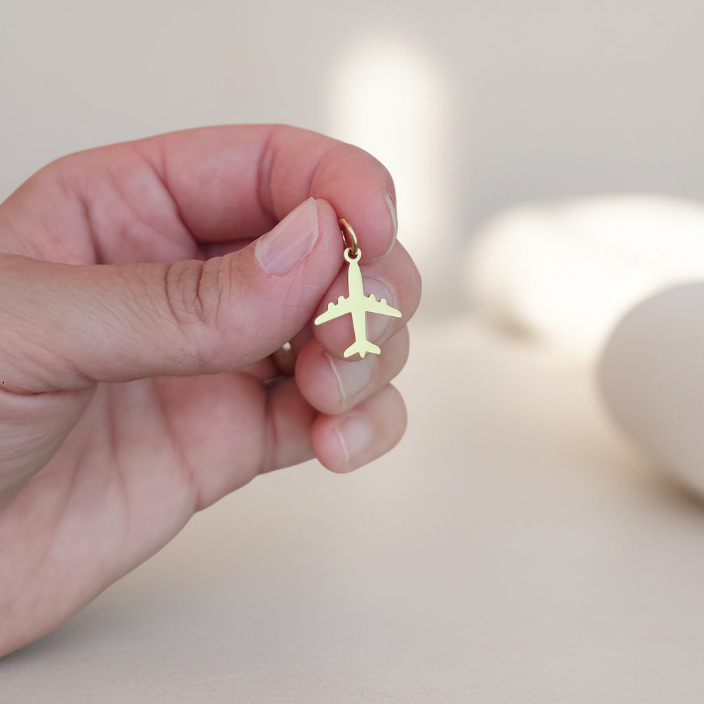 Charm aereo gold