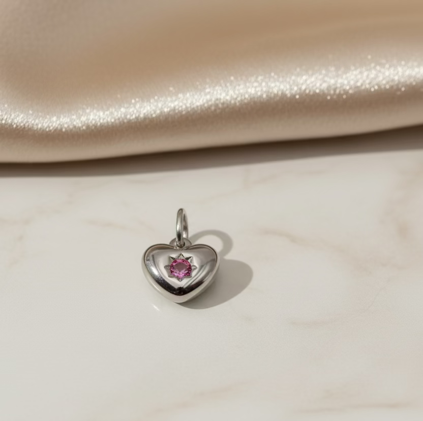 Ciondolo cuore punto luce rosa