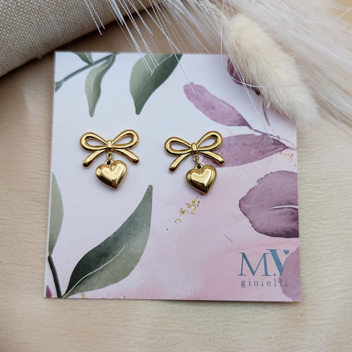 Orecchini fiocco cuore gold