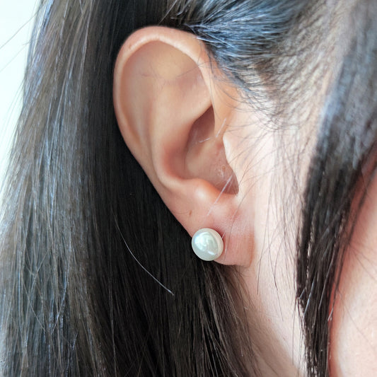 Orecchini perline schiacciate bianche