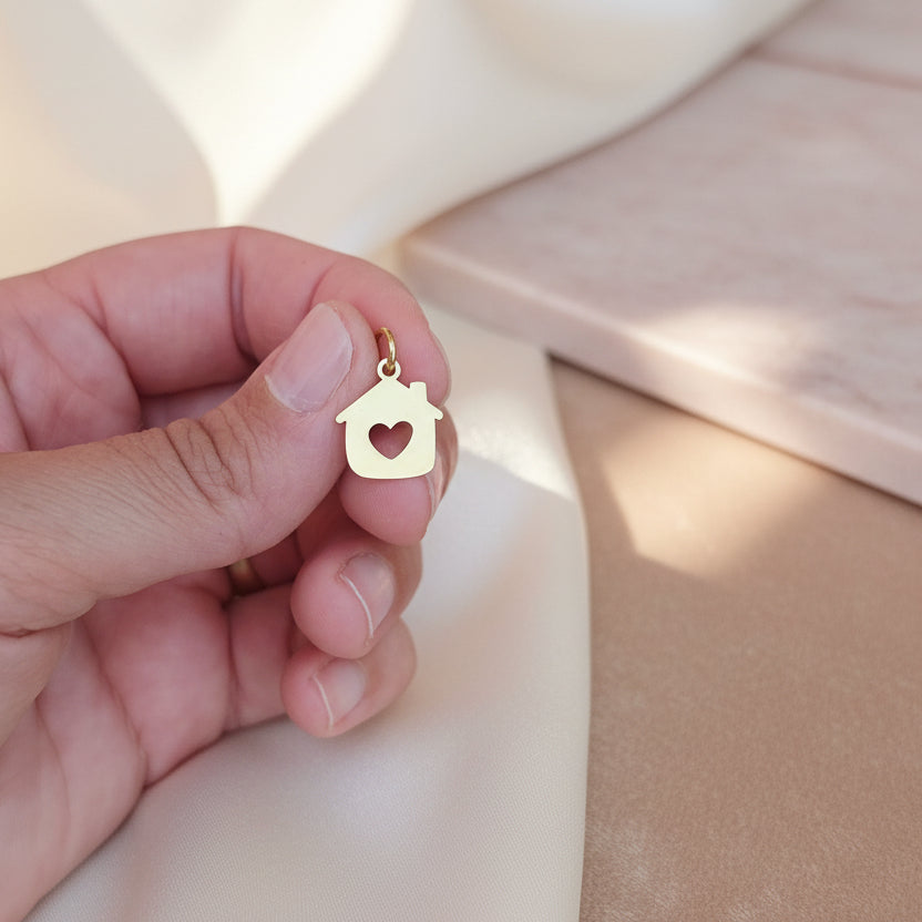 Charm casetta cuore traforato gold