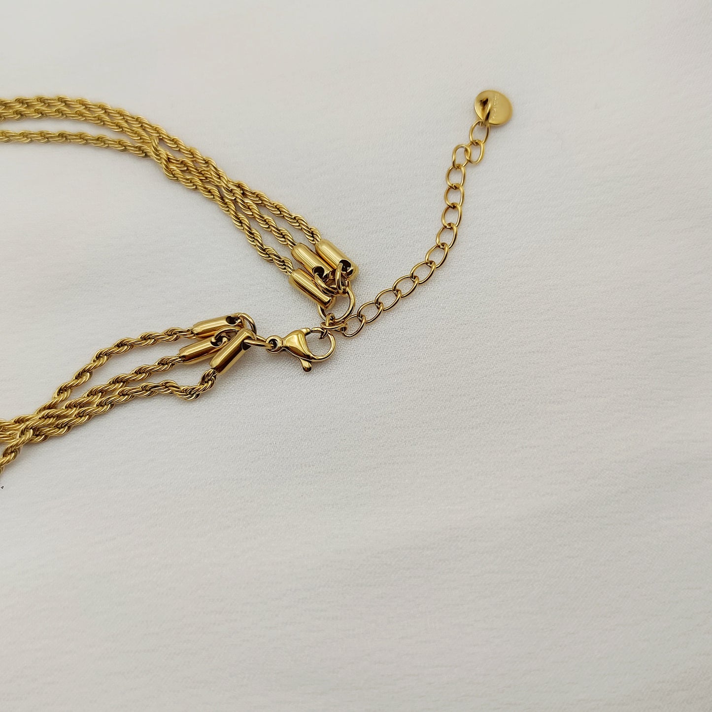 Collana tre fili torcion oro