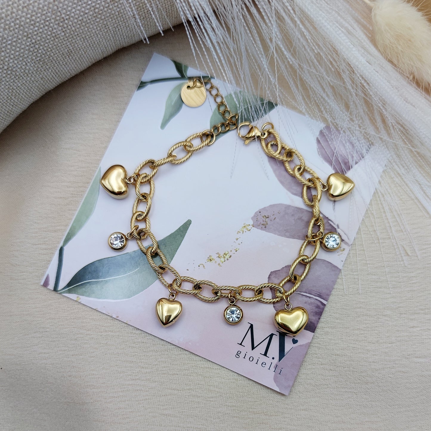 Bracciale multicharms cuori bombati gold