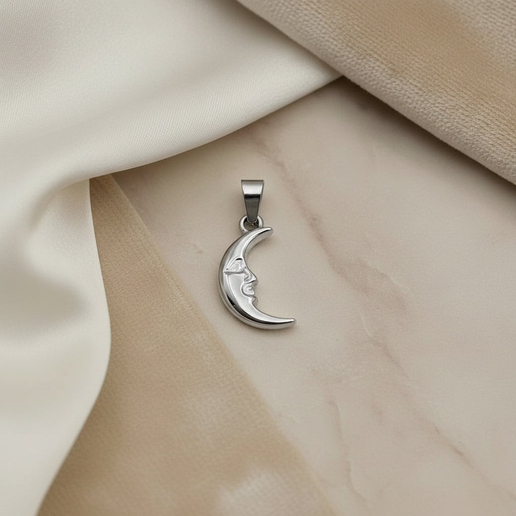 Ciondolo luna con volto acciaio