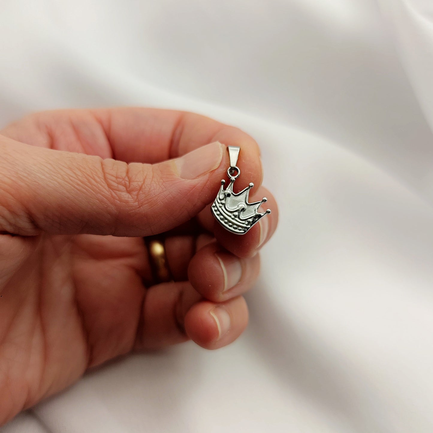 Ciondolo corona acciaio