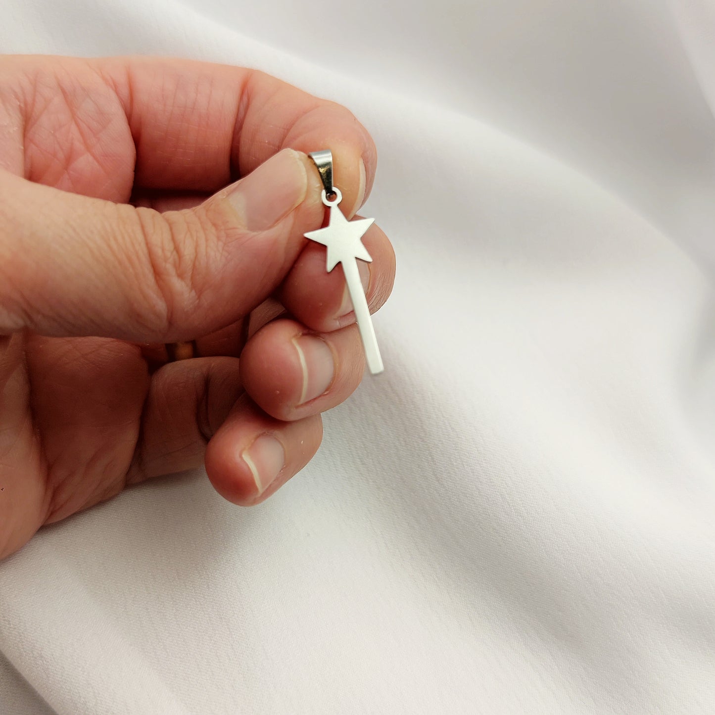 Ciondolo bacchetta magica acciaio