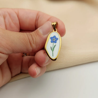 Ciondolo fiore azzurro irregualr