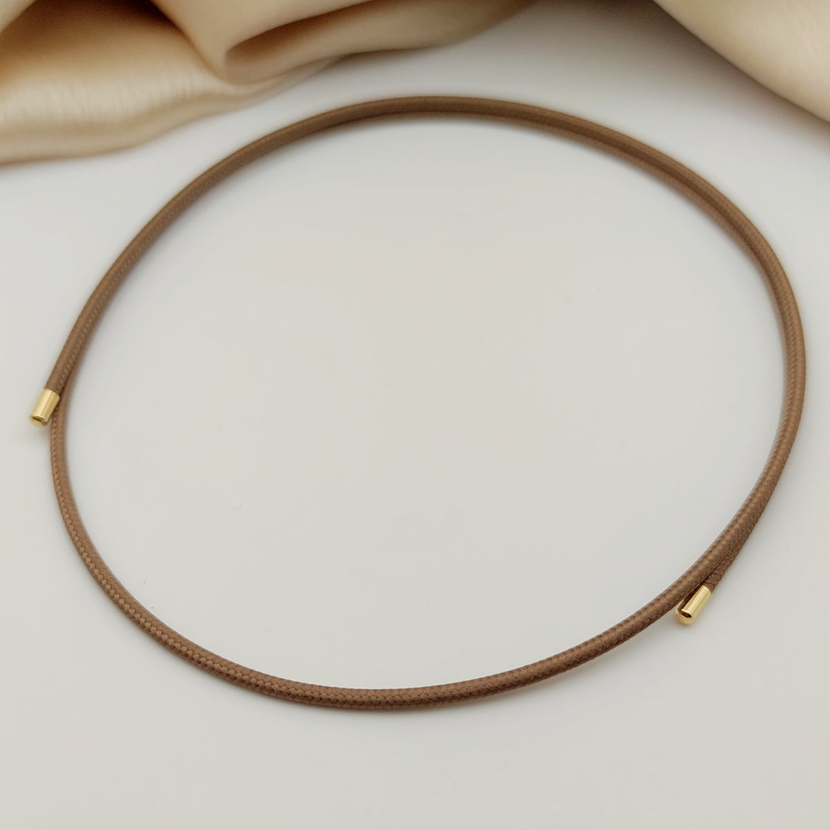 Choker calamita marroncino chiaro