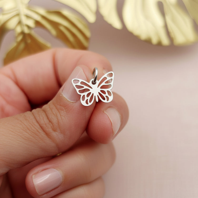 Charm farfalla traforata argento